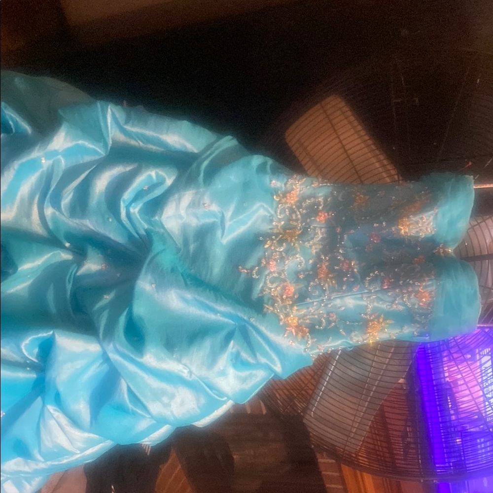 Chic Turquoise Dress with Floral Details